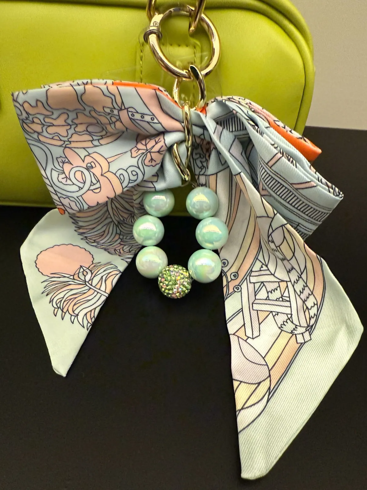 Online Borsa lime con charm Borse