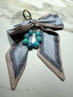 Discount Charm per borsa fiocco celeste nude Charm Per Borse