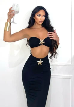 Clearance Completo top e gonna con stella nero Completi & Tute