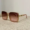 Online Occhiale rosa stecche oro con catenine Occhiali