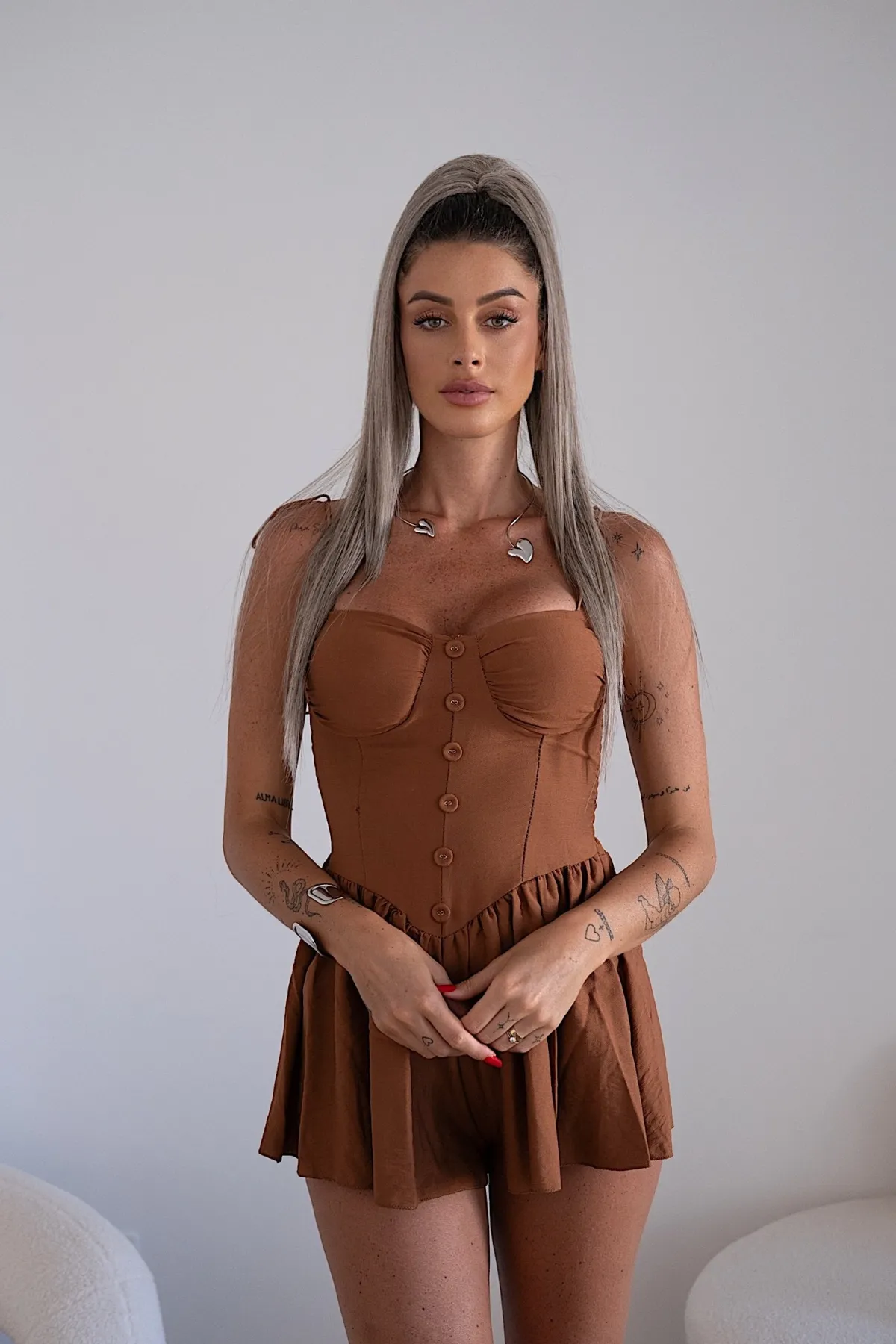 Sale Tutina choco con bottoncini Completi & Tute